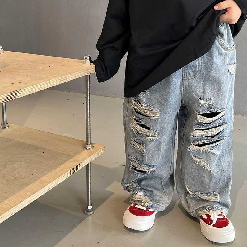 Spring and autumn childrens baby boys denim childrens clothing jeans casual childrens baby boys torn childrens jeans W240803