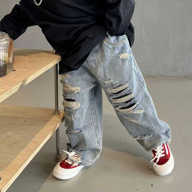 Spring and autumn childrens baby boys denim childrens clothing jeans casual childrens baby boys torn childrens jeans W240803