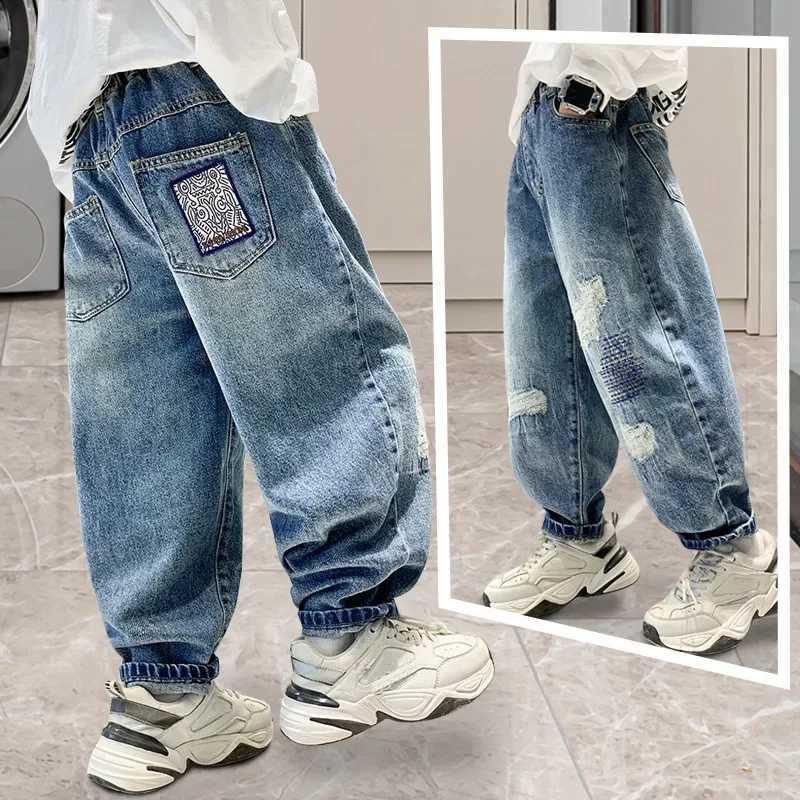 Boys jeans childrens casual high waisted jeans cartoon printed denim pants children aged 5 to 14 2024 spring/summer cotton pants W240803