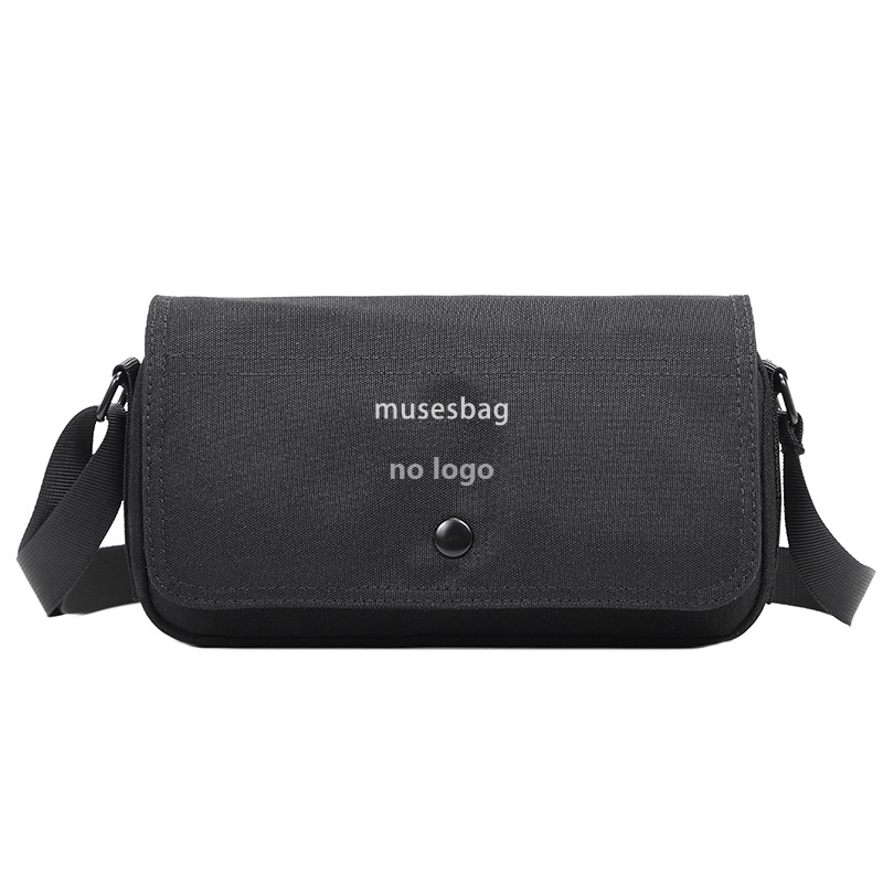 Korean version of simple retro men and women with a solid color canvas single shoulder crossbody bag Japanese casual student male