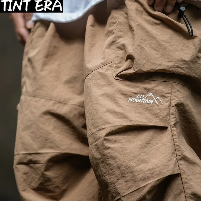 TINT ERA Parachute Cargo Pants Men Oversize Outdoor Casual Trousers Male Waterproof Man Japanese Streetwear Hip Hop 240806