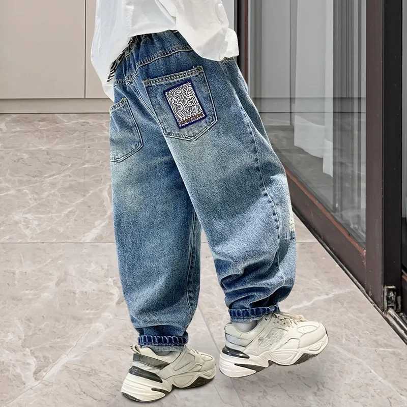 Boys jeans childrens casual high waisted jeans cartoon printed denim pants children aged 5 to 14 2024 spring/summer cotton pants W240803