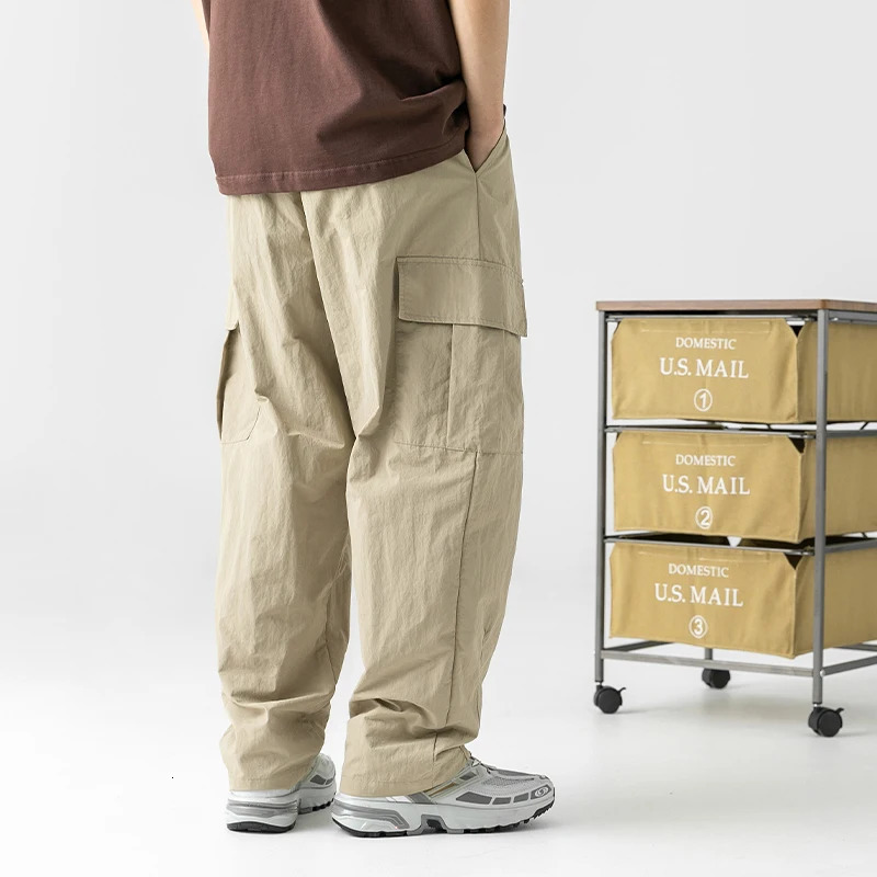 Micro pleated treatment waterproof function practical mens pants spring Japanese outdoor loose casual 240812