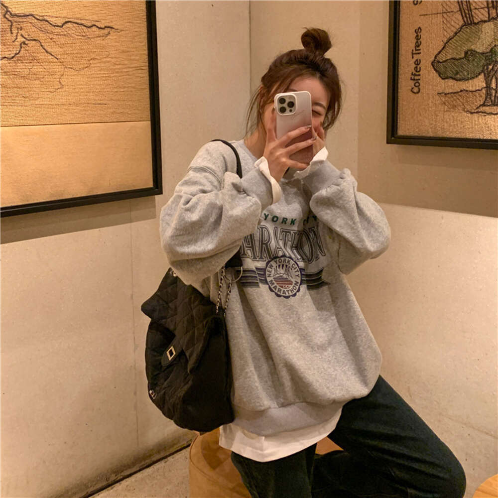 Autumn and Winter Loose Korean Version Spliced Fake Two Piece Long Sleeve Casual Sweater Female Student Personality Top Women's Fashion