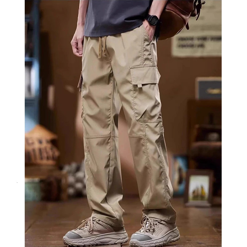 American High Street Fashion Casual Cargo Pants Men Solid Elastic Waist Drawstring Patchwork Pockets Versatile Straight Trousers 240806