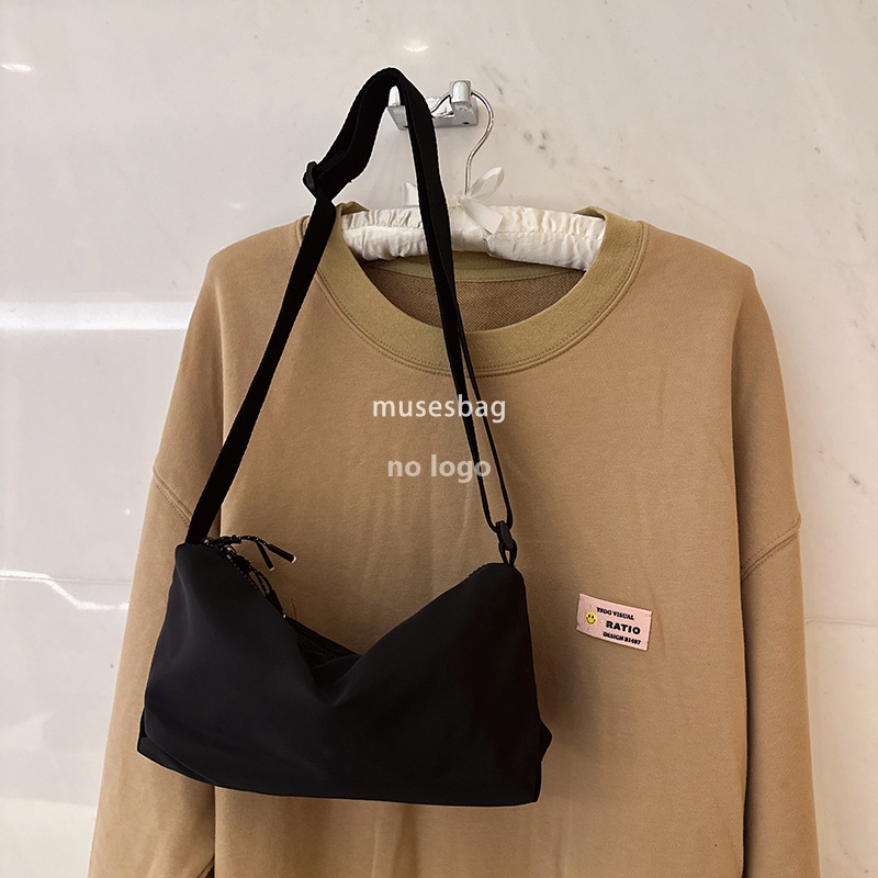 Sports leisure solid color crossbody bag washed canvas bag female Korean version of a new shoulder bag small body bag for men and women