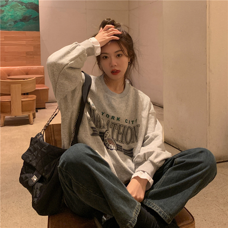 Autumn and Winter Loose Korean Version Spliced Fake Two Piece Long Sleeve Casual Sweater Female Student Personality Top Women's Fashion