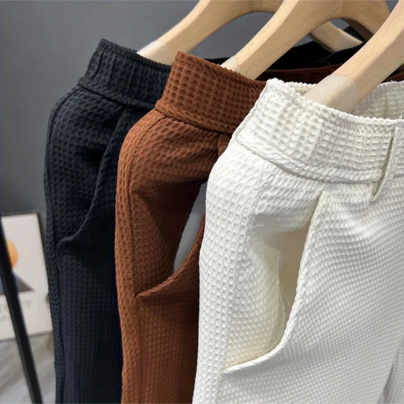 Leisure Trend Korean Edition Summer Solid Color Zipper Pocket Mens High Waist Elastic Slim Fit Straight Nine Split Pants 240806