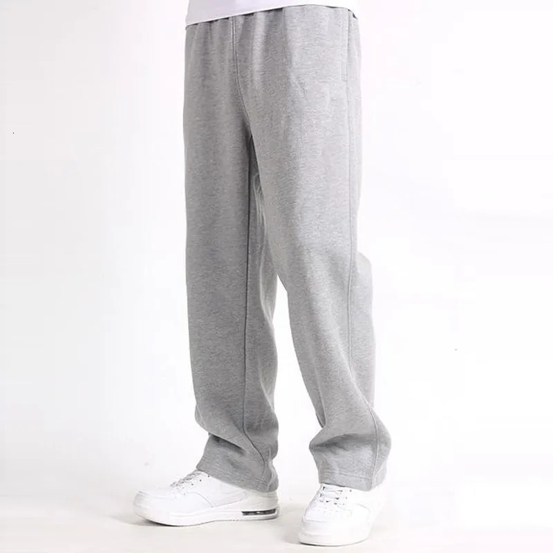 Spring mens plus size pants with solid pockets loose elastic cotton sports casual autumn straight 240821