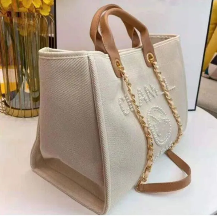 New Designer Shopping Bags Handbags Pearl Beach Bag Canvas Portable High-capacity Fashion Trend Women Bag letter printed bag fashion underarm bag White