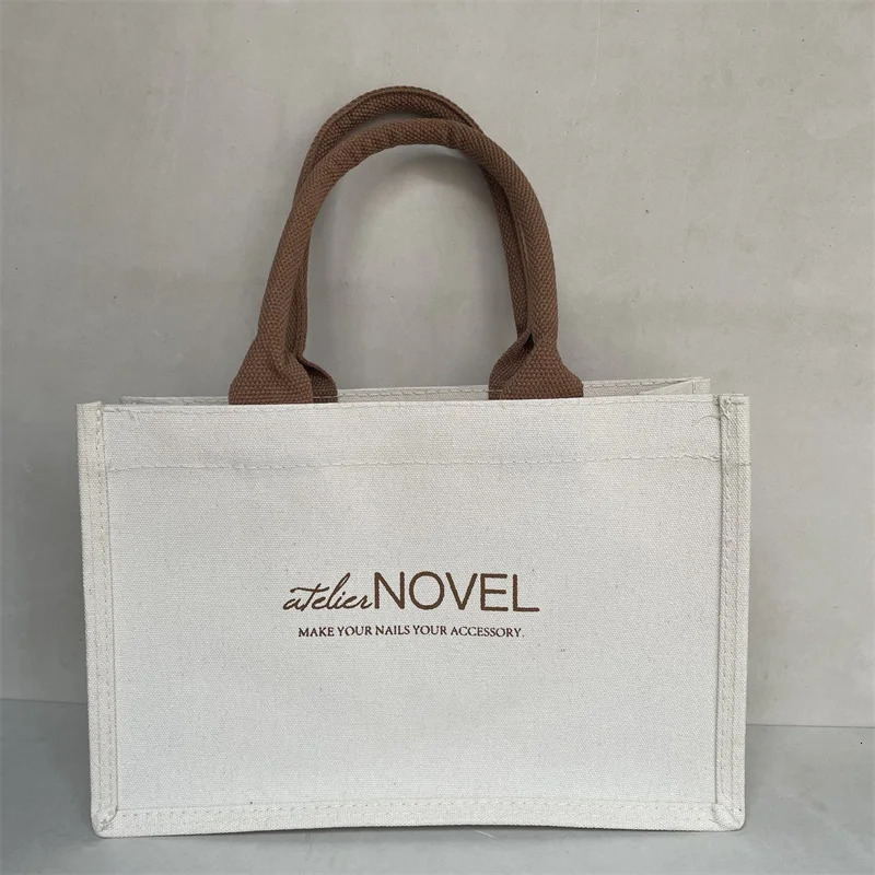 100 piecesbatch customized highquality canvas shopping bags with PVC lining environmentally friendly and reusable printed cotton handbags 240807