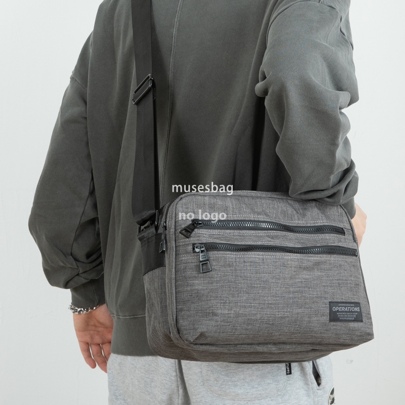 Korean casual large capacity canvas shoulder bag men's horizontal messenger bag Fashion trend multi-layer female crossbody bag