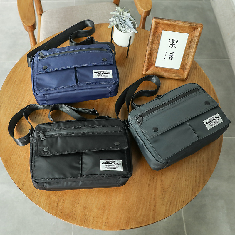 Korean shoulder bag men's simple crossbody bag Oxford cloth horizontal messenger bag Fashion travel backpack trend crossbody bag