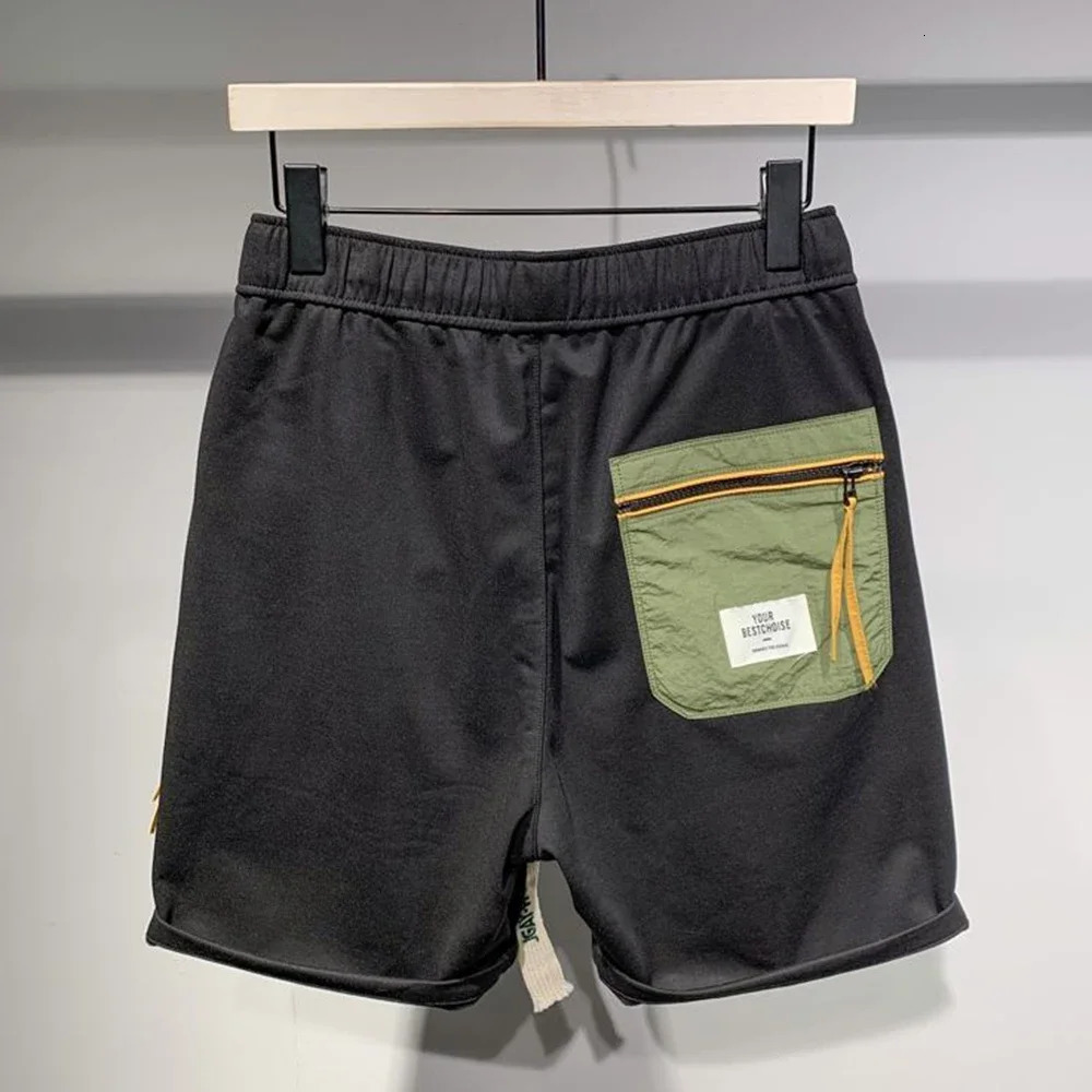 2024 Japanese fashion contrasting color patchwork pocket casual shorts mens summer loose personalized workwear quarter pants mens240808