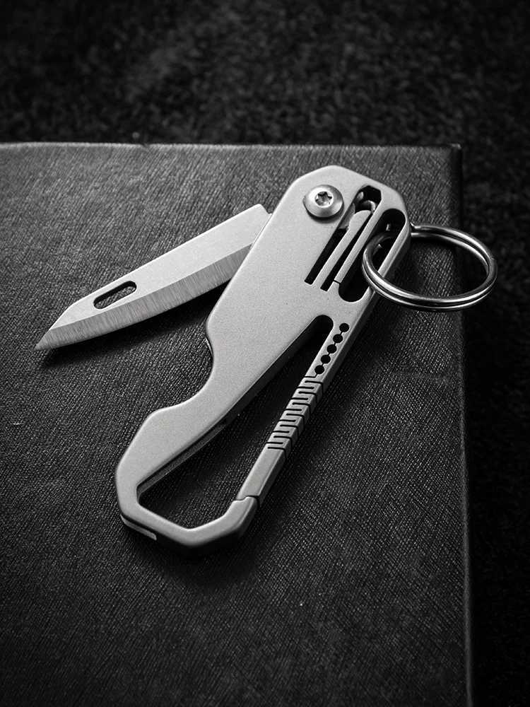 High quality titanium alloy multifunctional mens keychain with foldable small knife cart keychain outdoor EDC small tool W240808