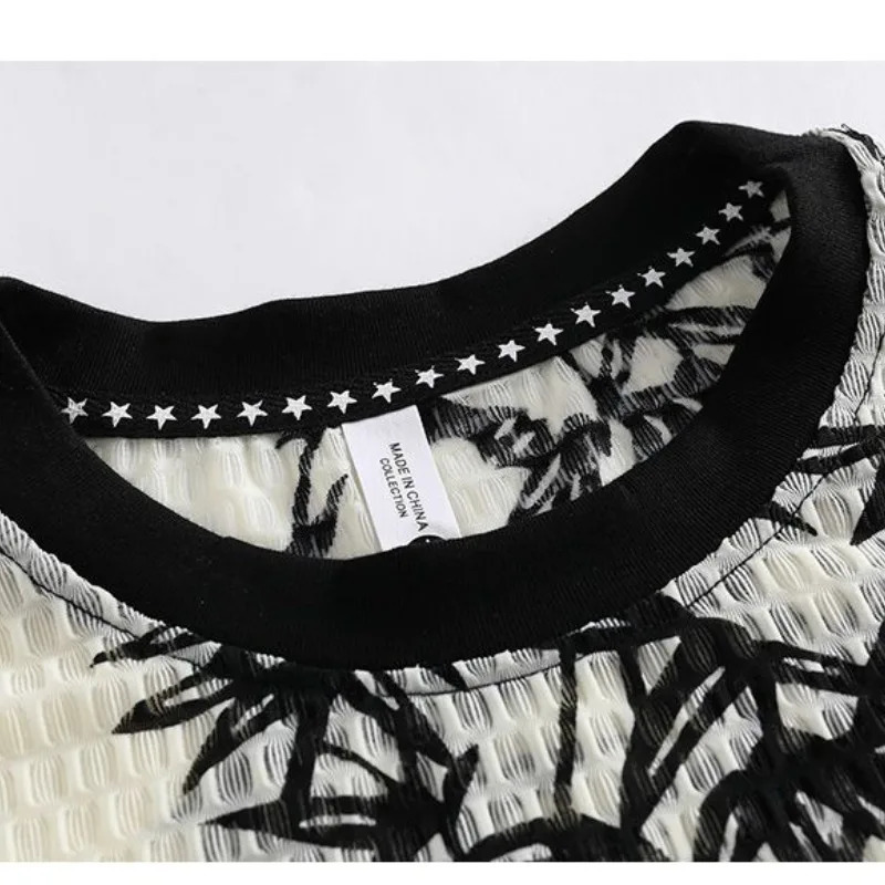 Simple and fashionable summer mens O-neck printed hollow high-dimensional fashionable casual fully matched loose short sleeved T-shirt top240808