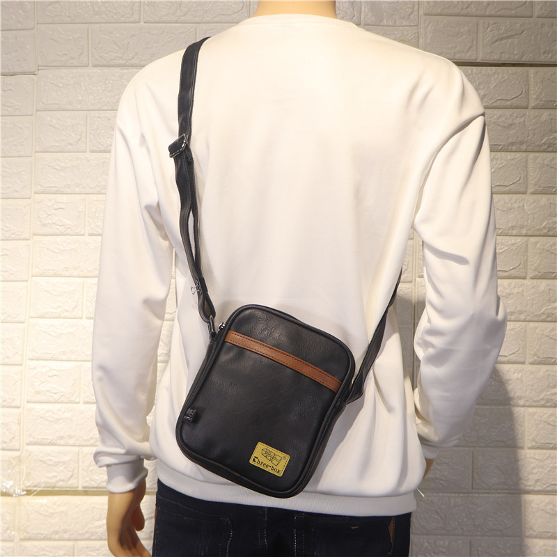 The new Korean version of the trend men's vertical small bag casual men's shoulder bag personality bag men's and women's crossbody