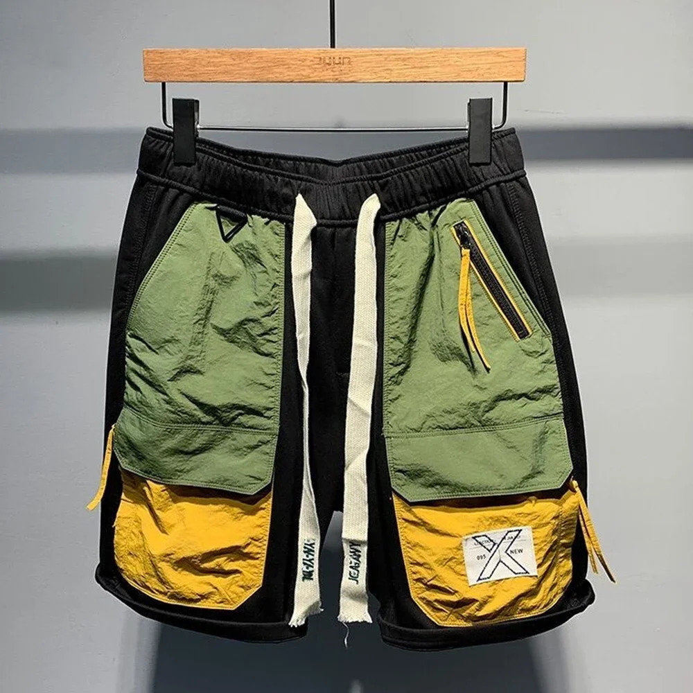 2024 Japanese fashion contrasting color patchwork pocket casual shorts mens summer loose personalized workwear quarter pants mens240808