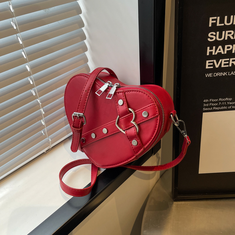 Fashion Designer Original Mini Handbag With Heart shaped Shape High quality And Multifunctional Compact Women s Rivet Shoulder Bag 2025 New Women s Wa