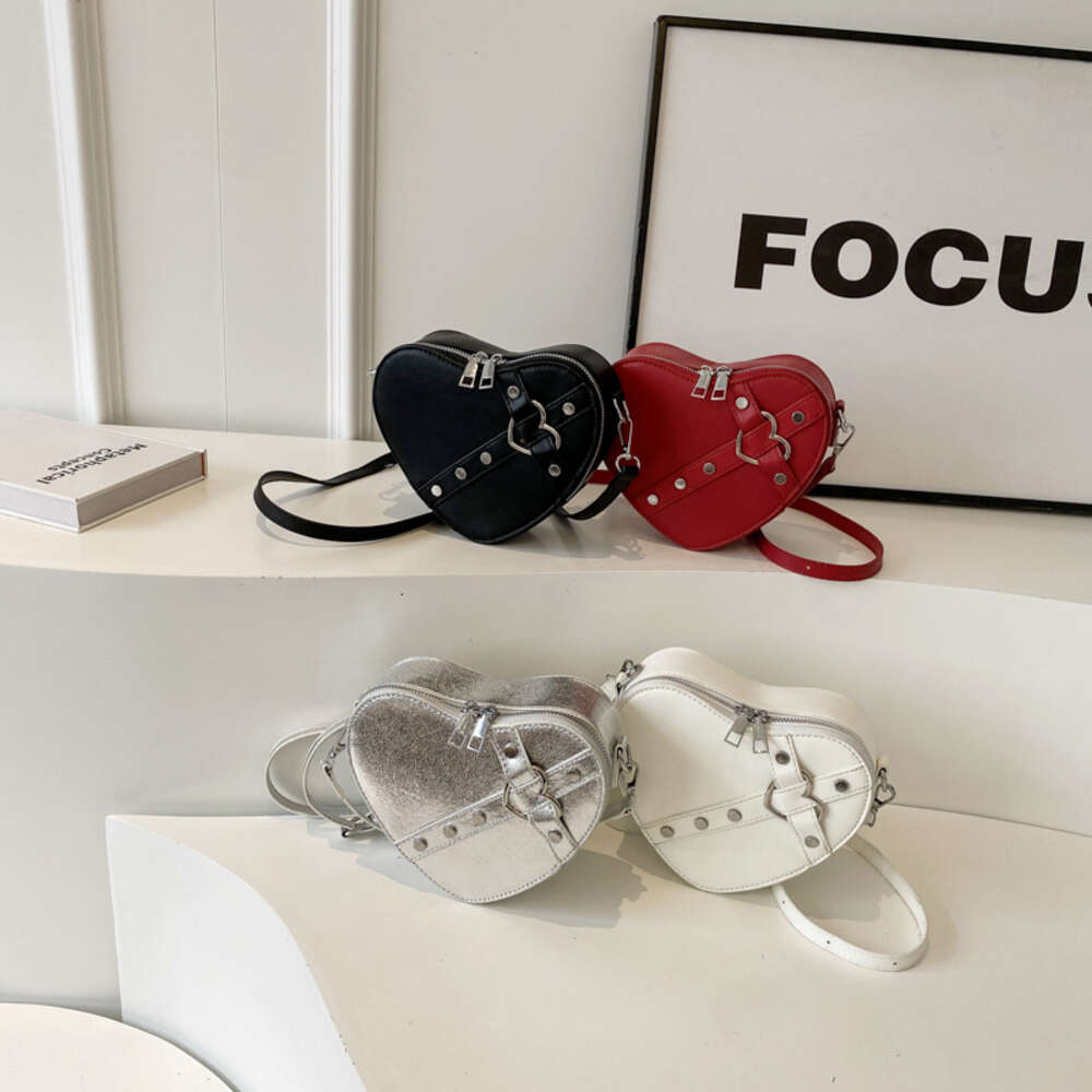 Fashion Designer Original Mini Handbag With Heart shaped Shape High quality And Multifunctional Compact Women s Rivet Shoulder Bag 2025 New Women s Wa