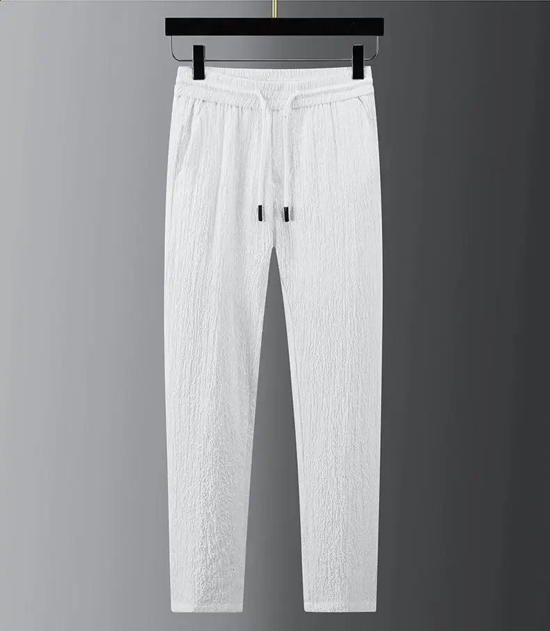 Mens set drawstring pants smart casual mens track suit spring and autumn pleated thin single button promotional 240809