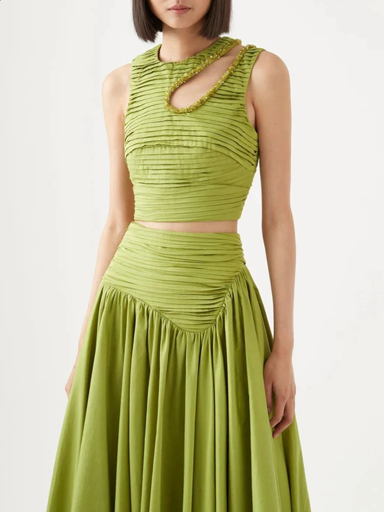 VGH ultrathin womens twopiece round neck sleeveless hollow pleated crop top irregular hem leather solid set 240810