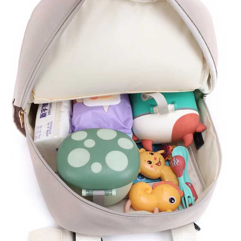A new type of mother dialing bag with dialing pad care bag for pregnant women USB multifunctional portable large baby stroller hanging bag W240812