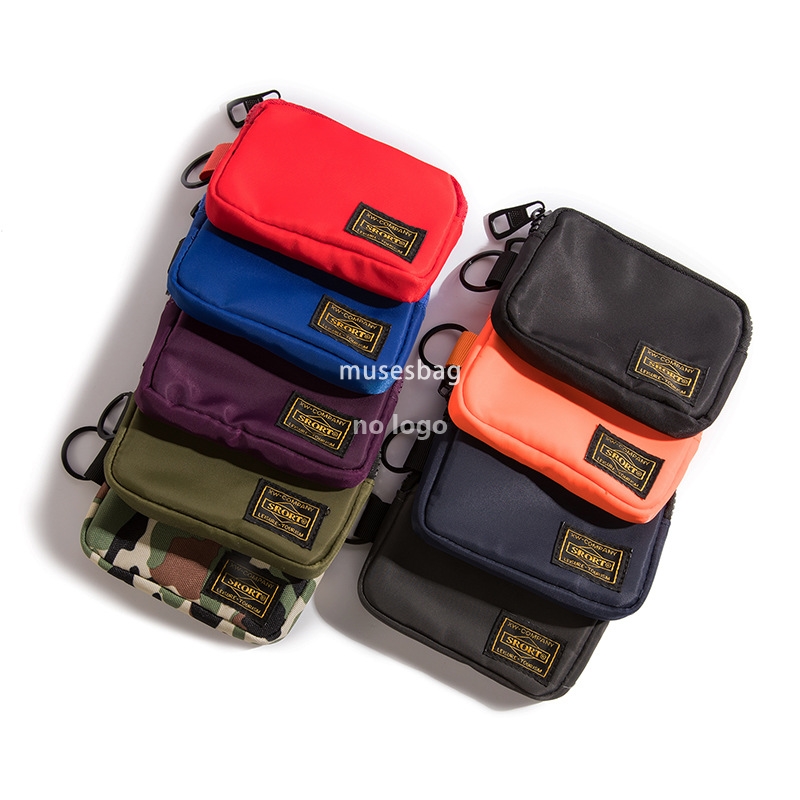 Japanese fashion small hanging bag tooling wind purse men's and women's casual all-match headphones bag personality mouth red envelope key b