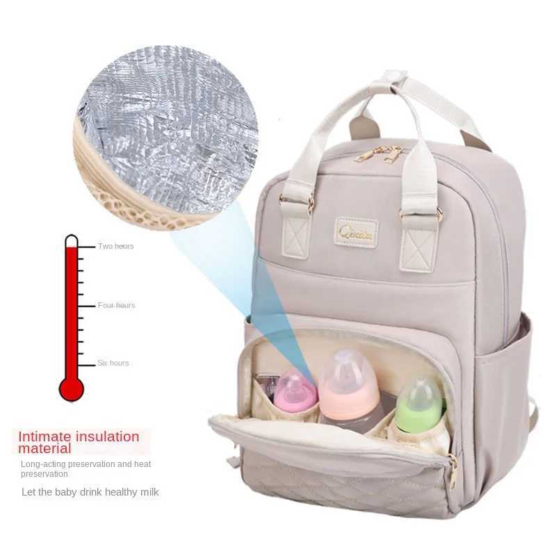 A new type of mother dialing bag with dialing pad care bag for pregnant women USB multifunctional portable large baby stroller hanging bag W240812