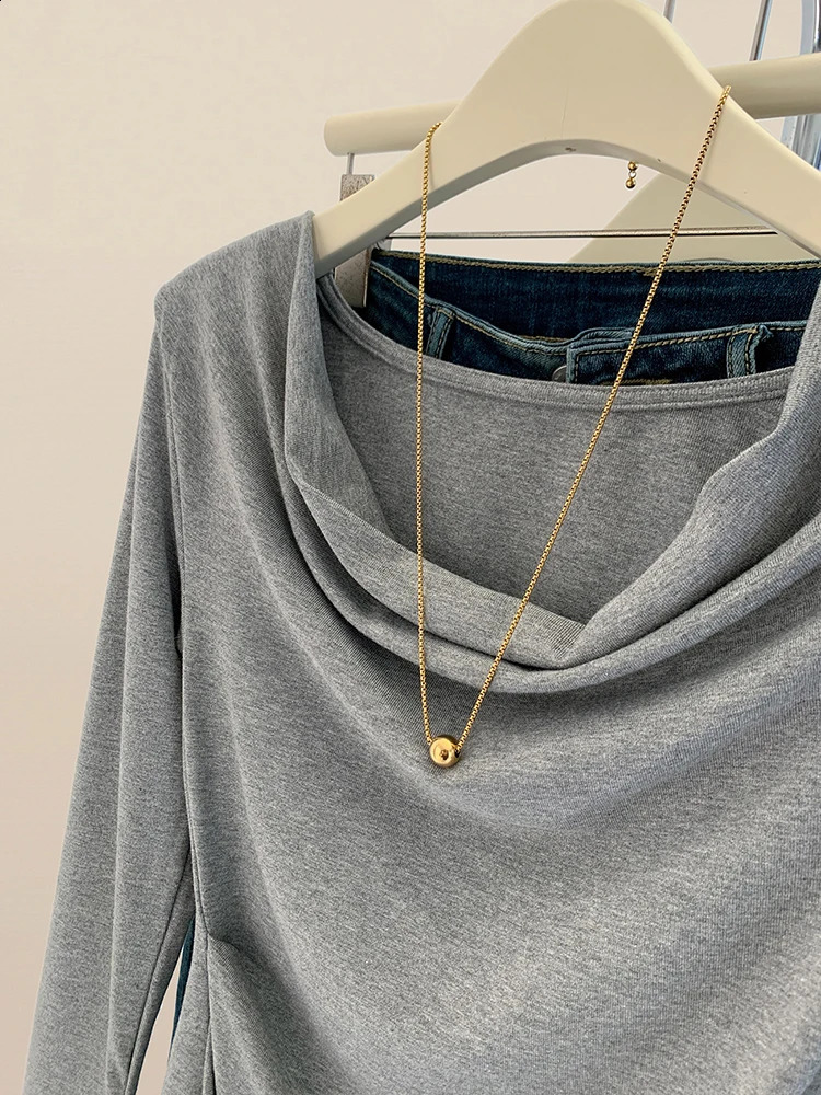 Swinging collar long sleeved Tshirt womens autumn sexy irregular ultrathin top fashion version solid color 240812