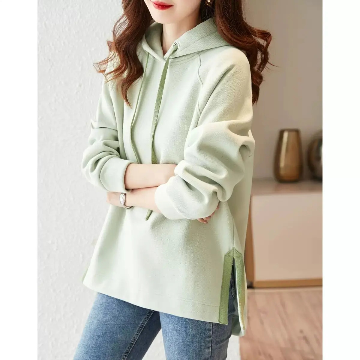 Spring and Autumn Fashion Trend Minimalist Casual Loose Oversize Long Sleeved Hem Split Hooded Tie Up Sweater for Women 240812