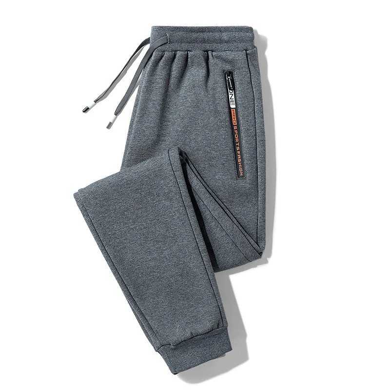 2022 Autumn Mens Sport Pants Casual Knitted Trousers With Zipper Pockets Solid Color Jogger pants Male pantalon chandal hombreXJ240813