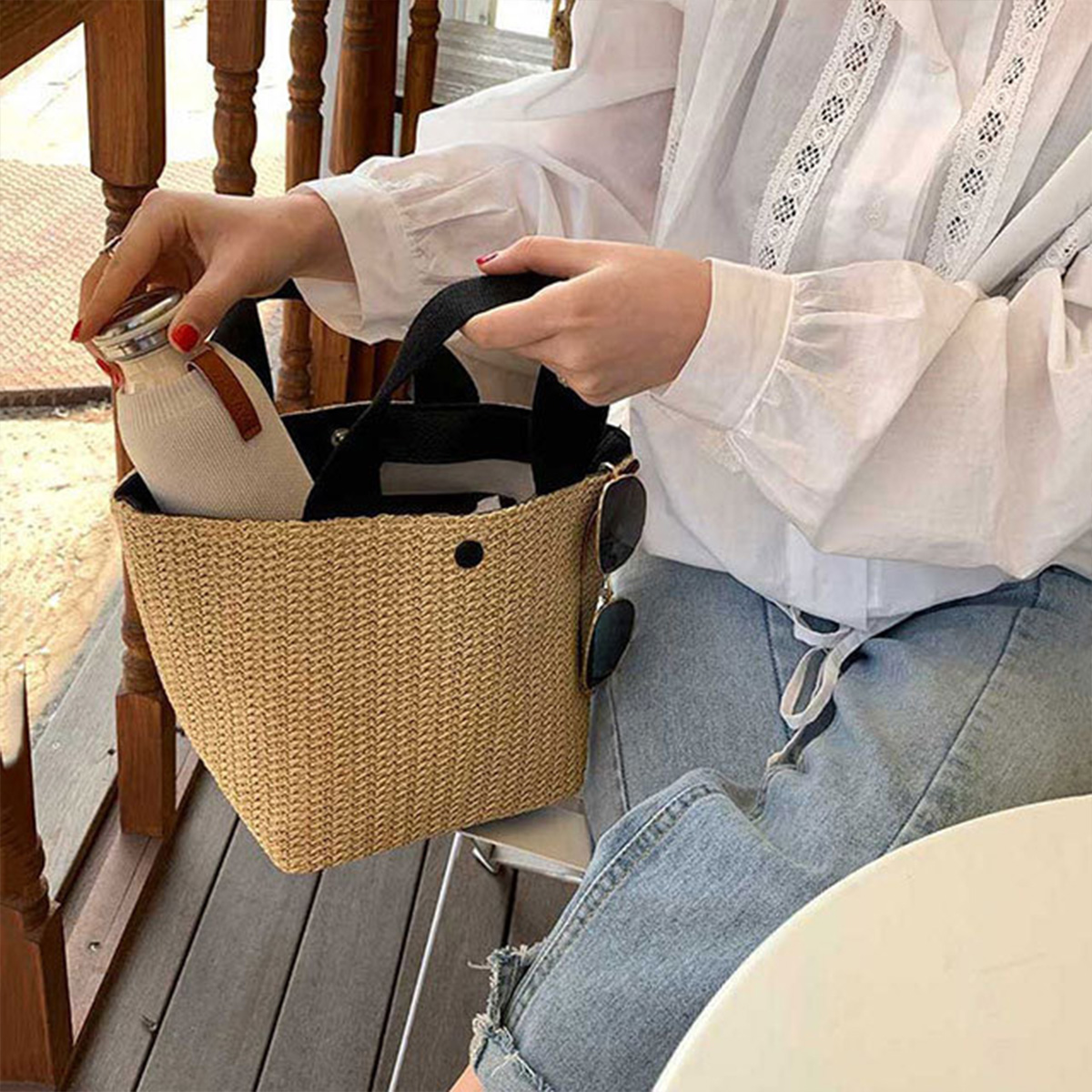 The tote bag new rural style woven bag retro casual hand-held grass woven bag summer beach vacation women's bag