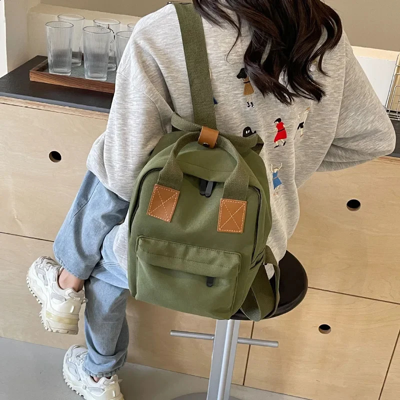 Korean womens canvas fashionable backpack autumn minimalism endurance appearance college student compon color travel bag 240813