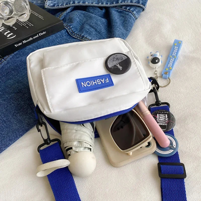 Japanese style Versatile solid color nylon shoulder bag womens space element cross body mens student neutral mini square 240813