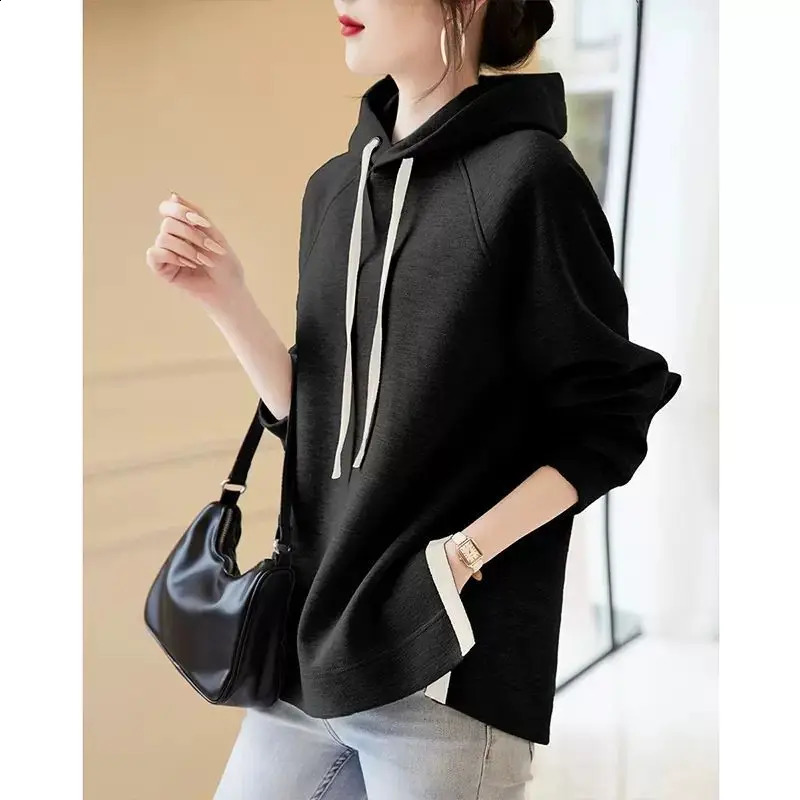 Spring and Autumn Fashion Trend Minimalist Casual Loose Oversize Long Sleeved Hem Split Hooded Tie Up Sweater for Women 240812