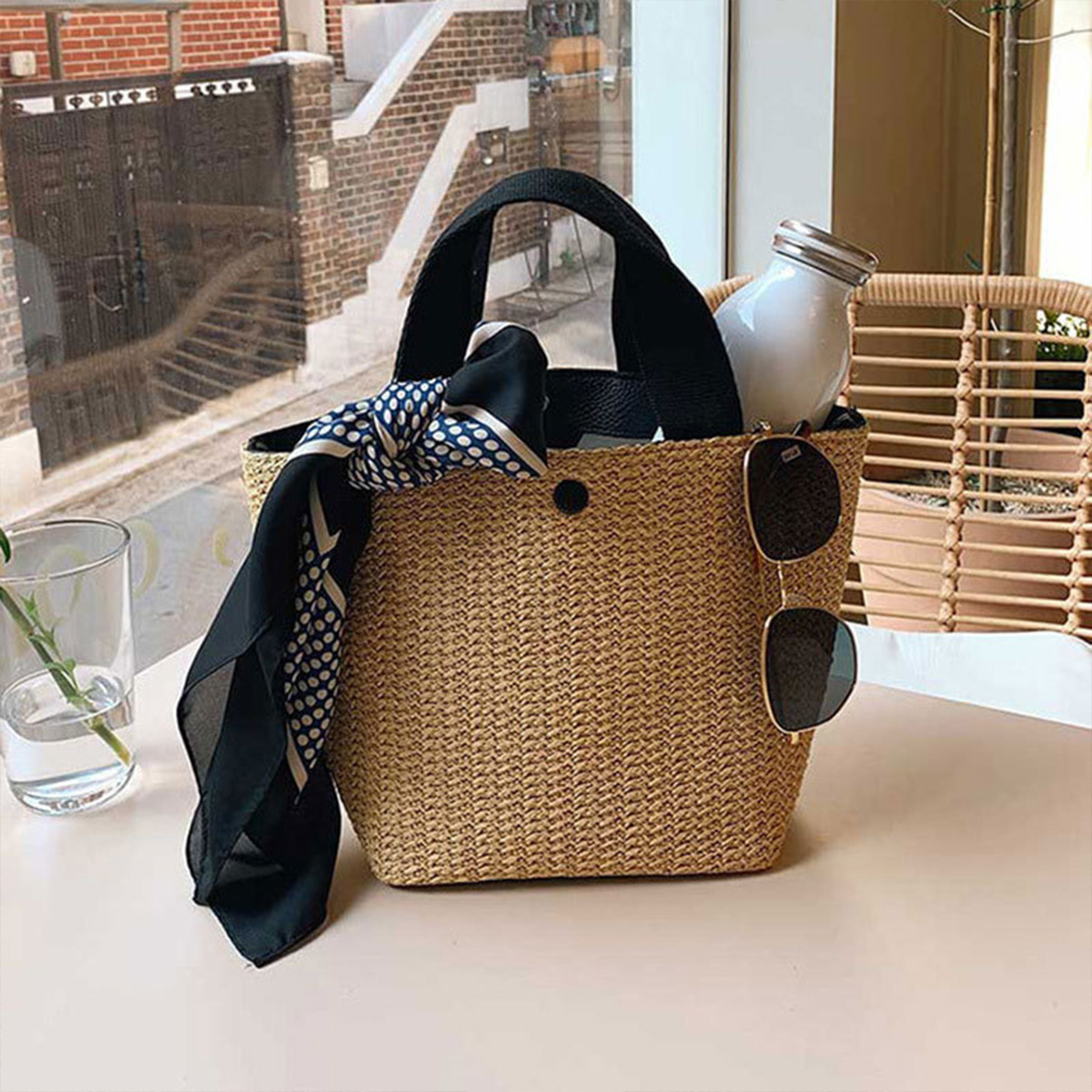 The tote bag new rural style woven bag retro casual hand-held grass woven bag summer beach vacation women's bag