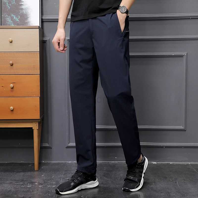 2024 Trendy Minimalist Mens Spring Autumn Solid Color Elastic Pocket Zipper Small Foot Fitness Versatile Sports Casual PantsXJ240813