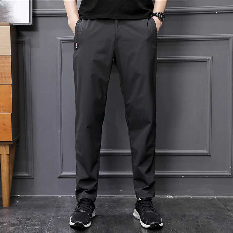 2024 Trendy Minimalist Mens Spring Autumn Solid Color Elastic Pocket Zipper Small Foot Fitness Versatile Sports Casual PantsXJ240813