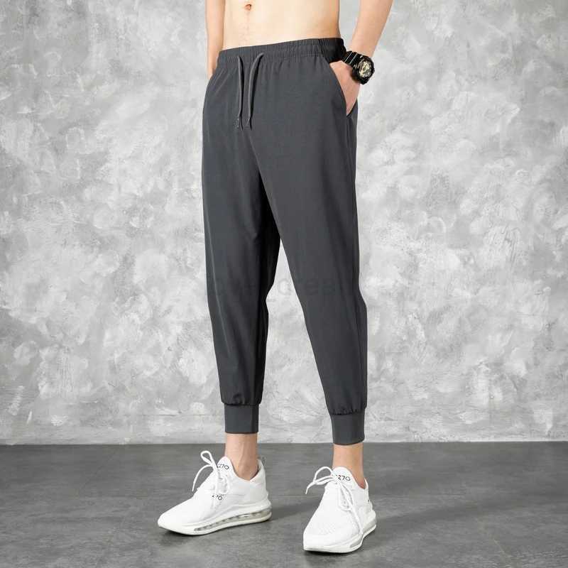Korean Ice Silk MenS Summer Thin Fashion Brand Loose And Versatile Quick Dry Casual Pants 9-Point Sports Trousers BoyXJ240813