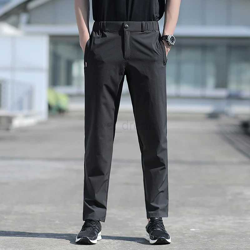 2024 Trendy Minimalist Mens Spring Autumn Solid Color Elastic Pocket Zipper Small Foot Fitness Versatile Sports Casual PantsXJ240813