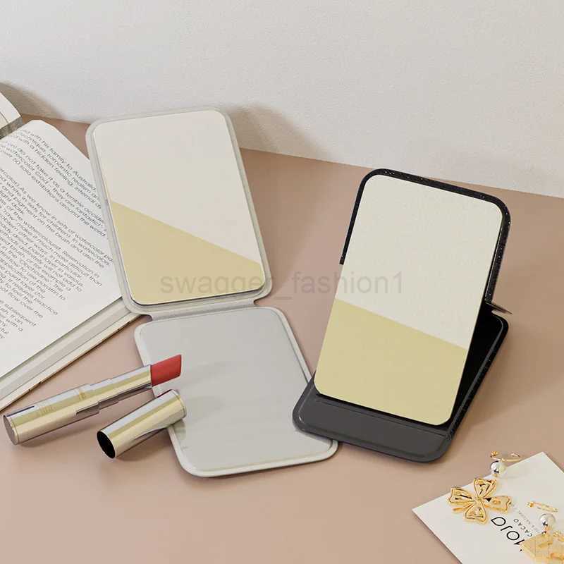 Small mirror for women to carry around simple handheld dormitory desktop standing super mini student portable folding makeupXJ240813