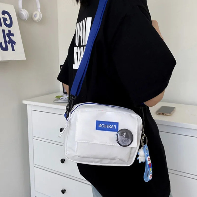 Japanese style Versatile solid color nylon shoulder bag womens space element cross body mens student neutral mini square 240813