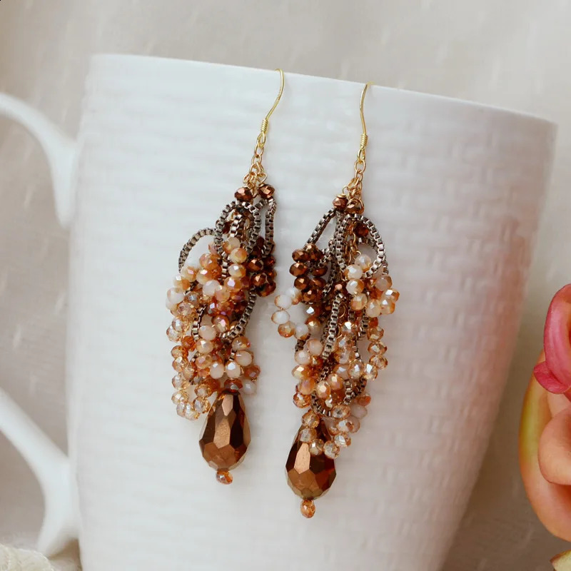 Bohemian style earrings ethnic handmade tassel earrings womens hollow bead pendant earrings jewelry gifts 240810