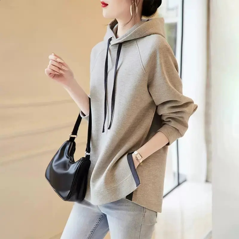 Spring and Autumn Fashion Trend Minimalist Casual Loose Oversize Long Sleeved Hem Split Hooded Tie Up Sweater for Women 240812