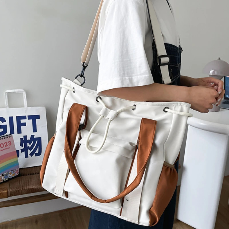 Anti splash nylon fabric shoulder cross body bag womens multi pocket drawstring handbag large capacity student backpack 240813