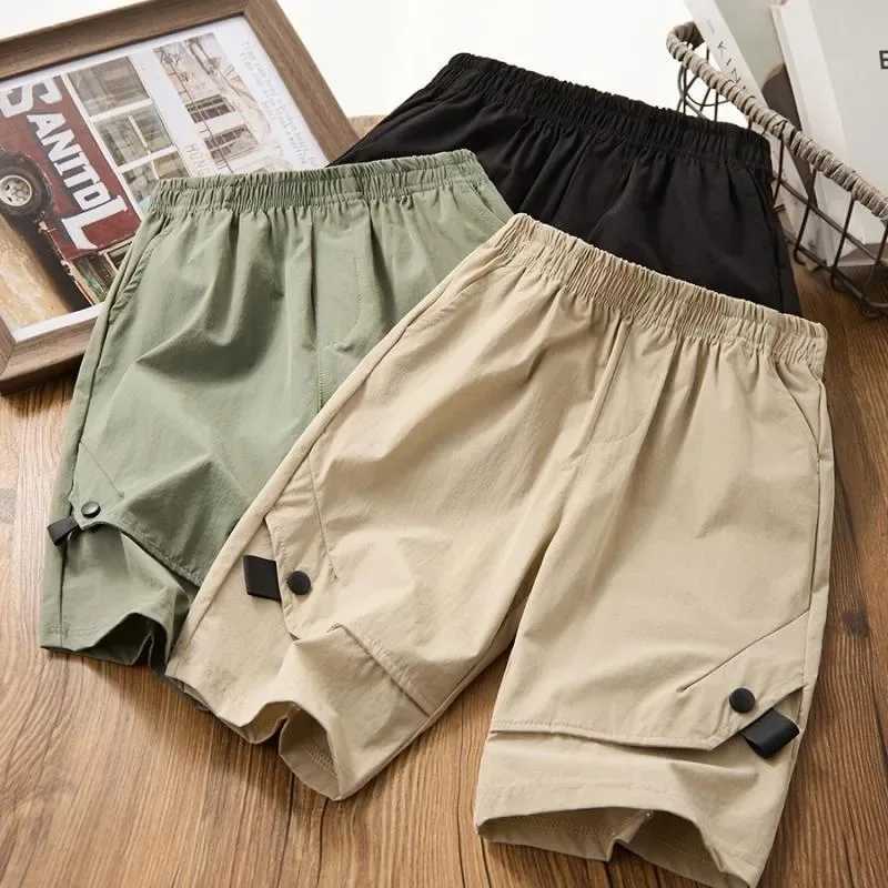 Boys shorts childrens solid color Trouser with button teenagers pocket shorts 2024 summer casual clothing for children aged 3 to 12 W240813