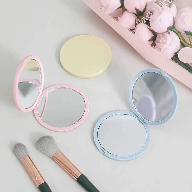 Wholesale of high-end circular folding small mirrors portable pockets flip mirrors mini double-sided makeup handheld mirrors W240813