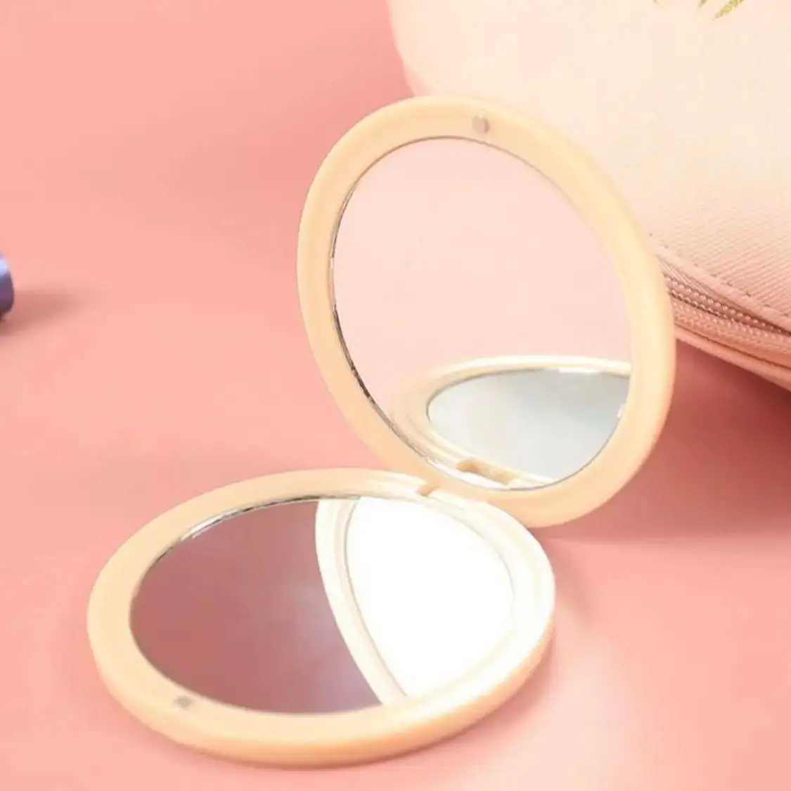 Wholesale of high-end circular folding small mirrors portable pockets flip mirrors mini double-sided makeup handheld mirrors W240813