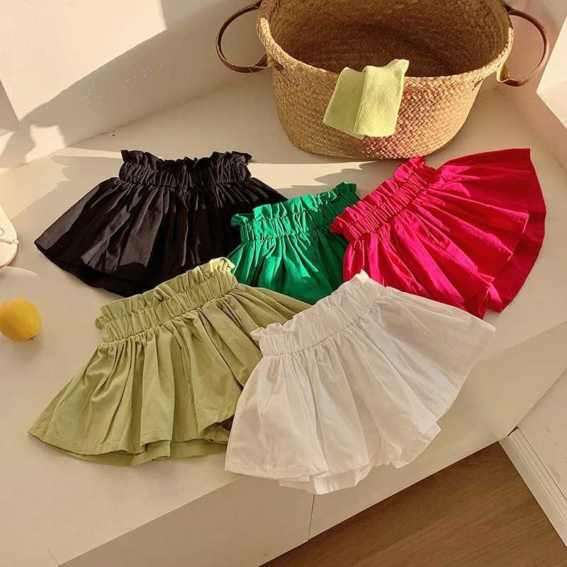 Girls shorts 2024 new summer Korean style pleated hem pants solid color petal pants childrens split style W240813
